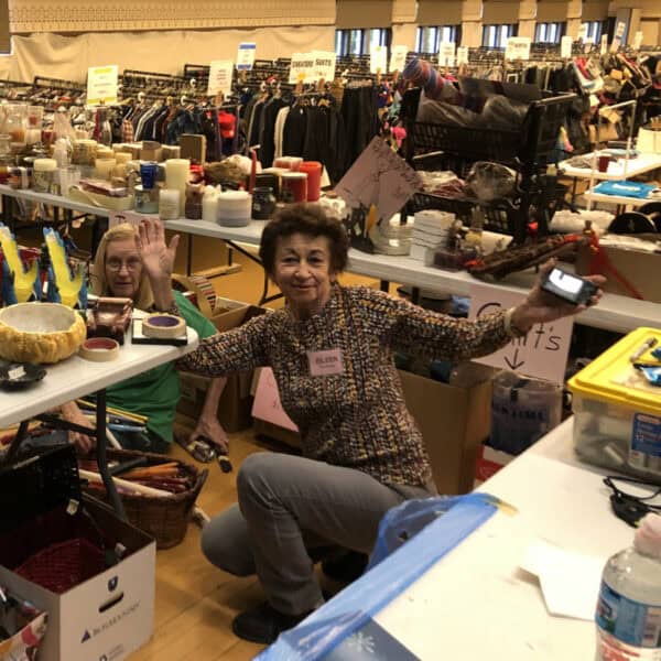 First Congo volunteers smiling at the Rummage Sale