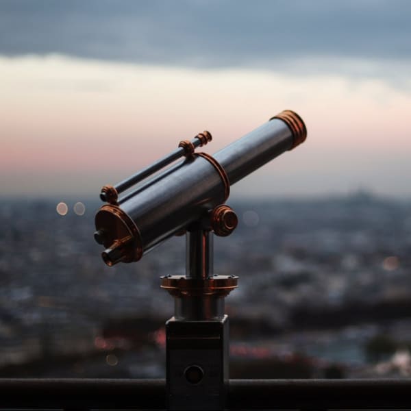 A telescope on top of a tall building