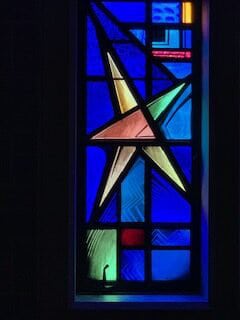 Extreme close up of a First Congo church stained glass window