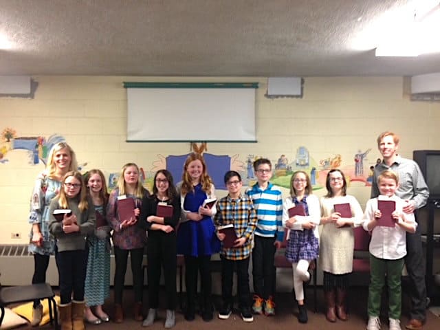 Sunday School kids holding bibles